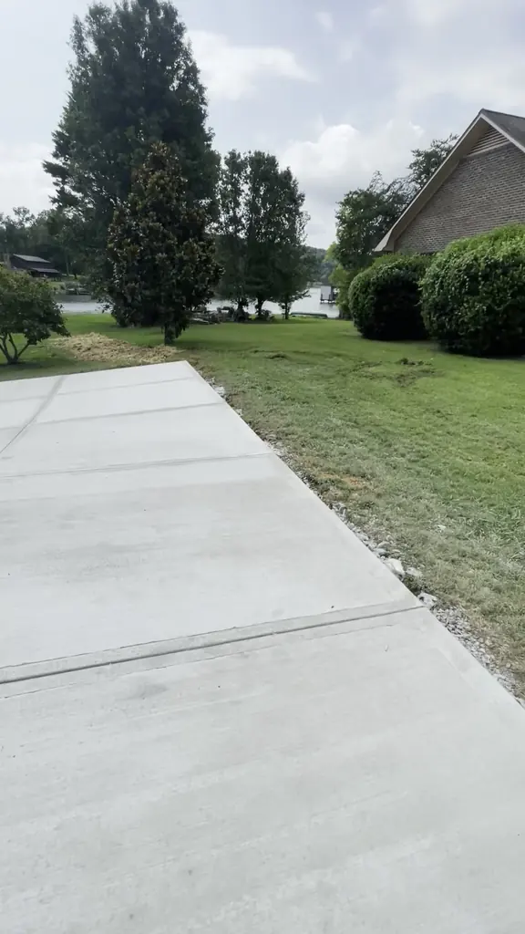 Concrete driveway running along the side of a home in Knoxville, Tennessee