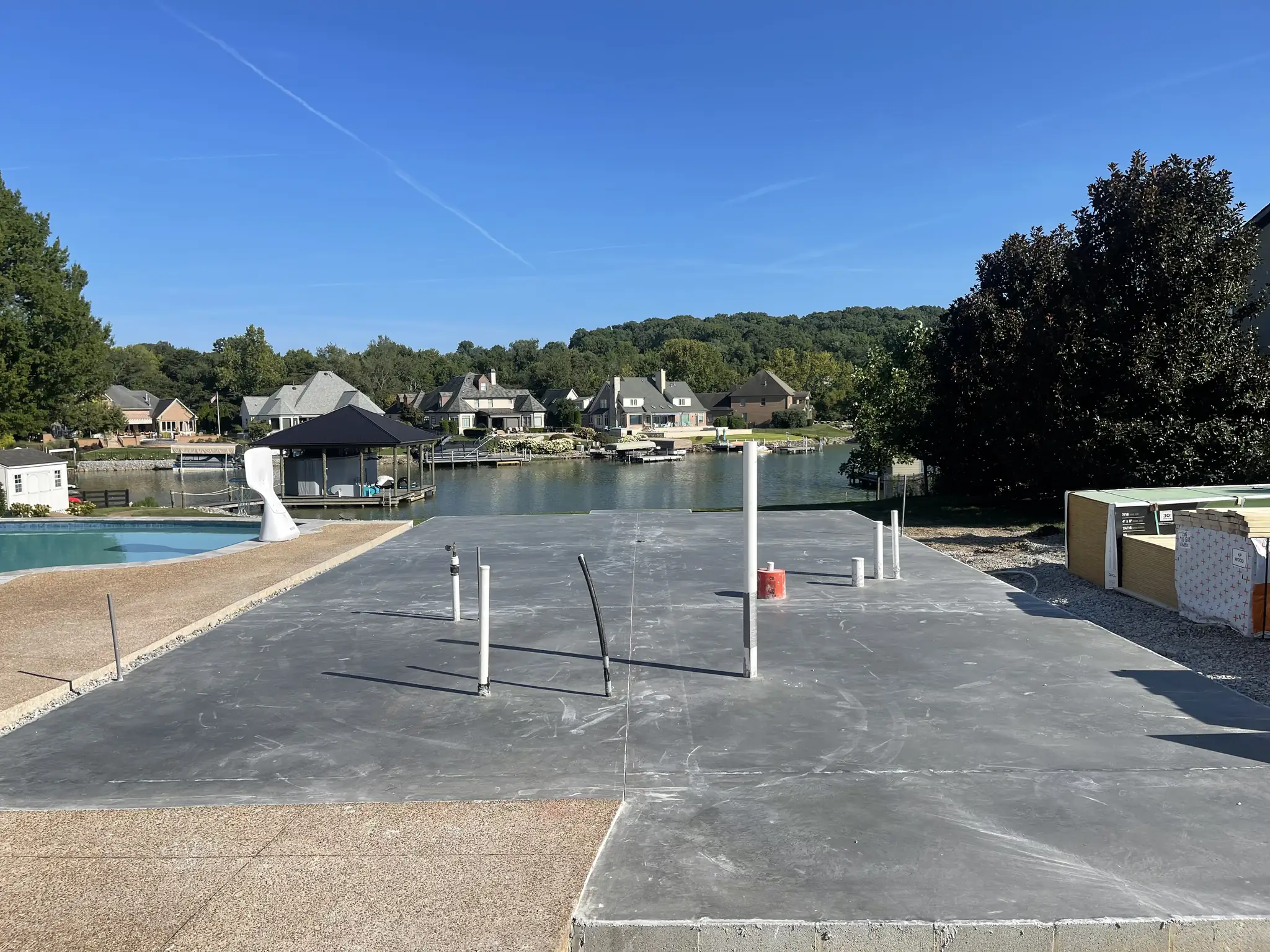 Finished concrete pool deck and patio at a lakefront home near Knoxville, Tennessee