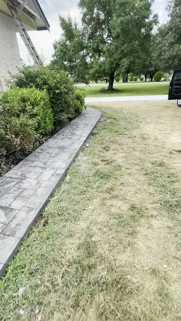Stamped concrete walkway running along the side of a home in Knoxville, Tennessee
